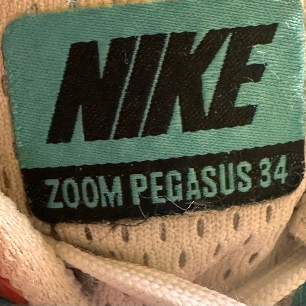 Nike Air Zoom Pegasus 34 in vibrant Sunburst Blue/White-Pink colorway - Picture 11 of 12